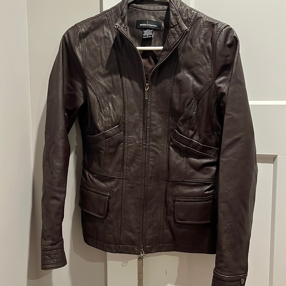 Leather jacket.  Super cute. Fitted. Size small Gently used
